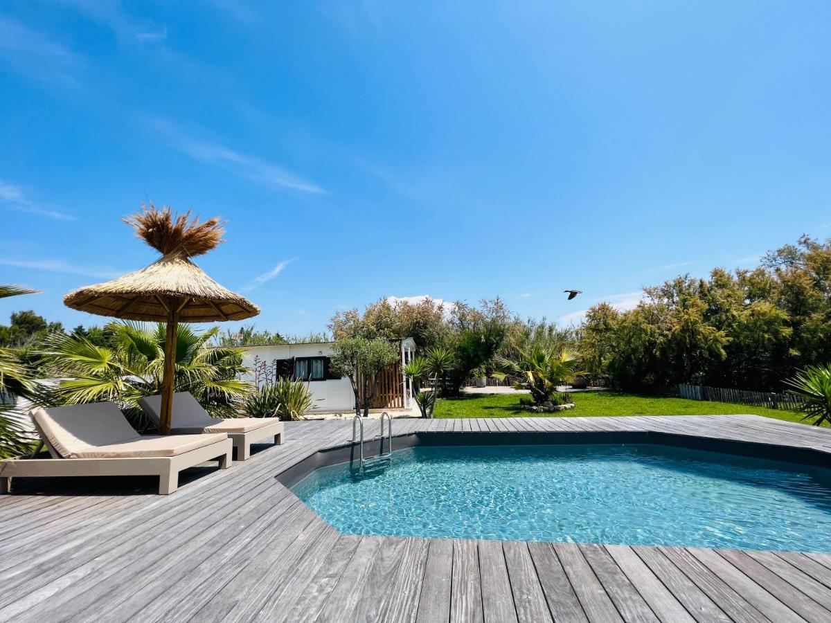Cabane Le Flamant Avec Jardin, Piscine Et Parking Saintes-Maries-de-la-Mer Bagian luar foto